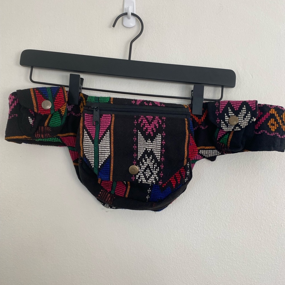 Black fanny pack with cool colorful tribal pattern, perfect for travel